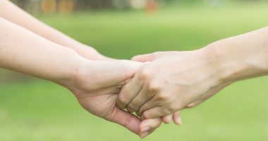 acupuncture for Parkinson's | Parkinson's News Today | two people holding hands