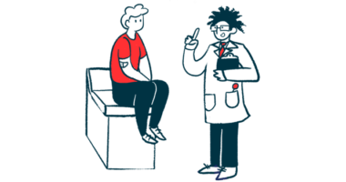 A doctor holds a clipboard and gestures while speaking with a patient seated on an examination table.