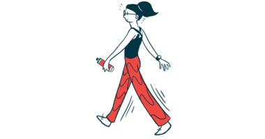 A woman wearing workout clothes walks holding small weights in each hand.