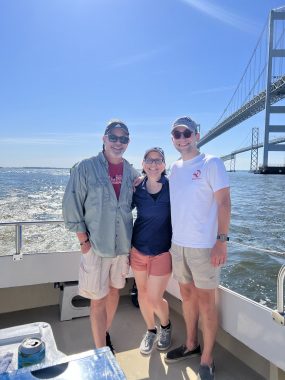 little victories | Parkinson's News Today | Lori DePorter poses on a boat with her brother Brian and her son Ryan after a day of fishing in the Chesapeake Bay.