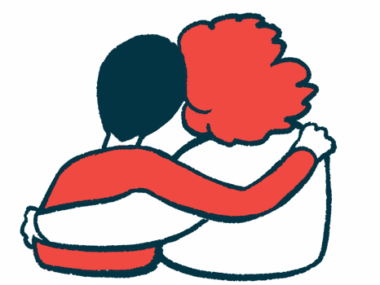 Two people are shown from behind with their arms wrapped around each other.