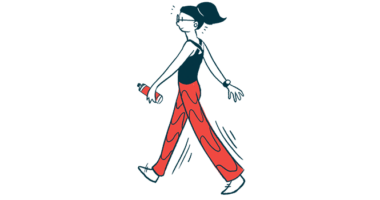 A person walks for exercise while carrying a water bottle in one hand.