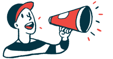 A person wearing a baseball cap uses a megaphone to make an announcement.