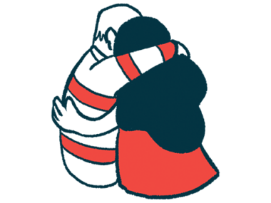 A view of a couple hugging one another.