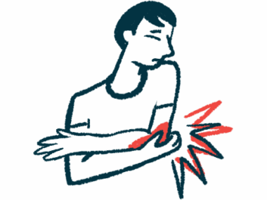 Person holds their elbow in pain.