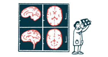 A researcher reviews images from a brain scan, which are shown magnified beside him.