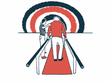 A therapist assists a patient seen walking on a mat between two parallel bars.