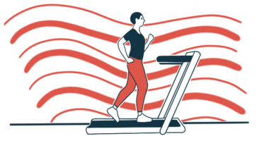 A person is seen walking on a treadmill.