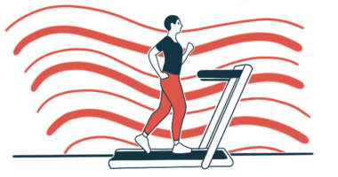 A person is seen walking on a treadmill.