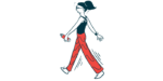 A person holding a water bottle in one hand is seen walking at a brisk pace.
