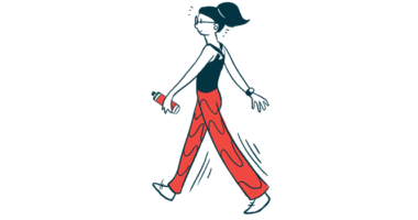 A person holding a water bottle in one hand is seen walking at a brisk pace.