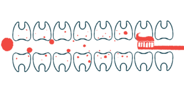 Illustration of toothbrush in between two rows of teeth.