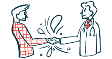 A man in a plaid jacket shakes hands with a clinician.