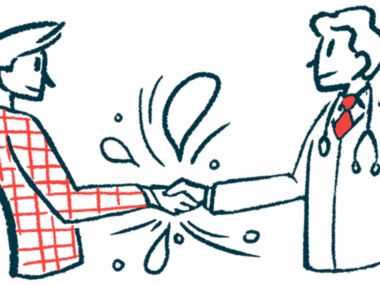 A man in a plaid jacket shakes hands with a clinician.