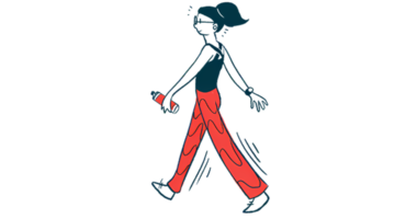 A woman walks while holding a water bottle.