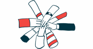 Many hands are seen coming together in a circle.