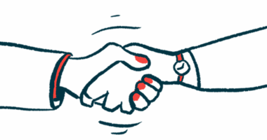 Two hands are clasped in a handshake.