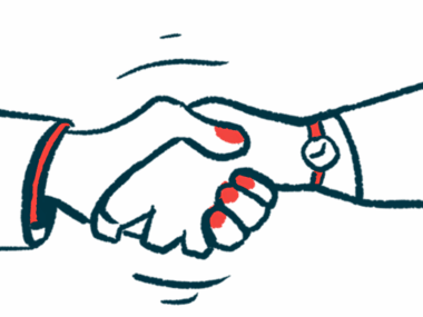 Two hands are clasped in a handshake.